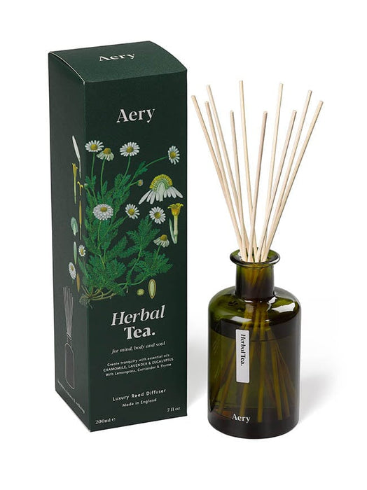 Green Herbal Tea diffuser by Aery displayed next to product packaging on white background 