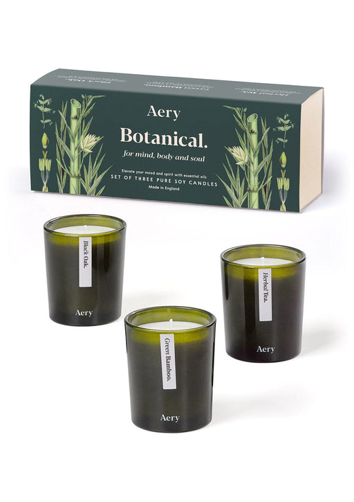 Green Botanical gift set of three mini candles by Aery displayed next to product packaging on white background 