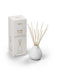 White Nordic Cedar diffuser by Aery displayed next to product packaging on white bacground 