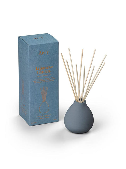 Blue Japanese Garden diffuser by Aery displayed next to product packaging on white background 