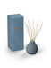 Blue Japanese Garden diffuser by Aery displayed next to product packaging on white background 