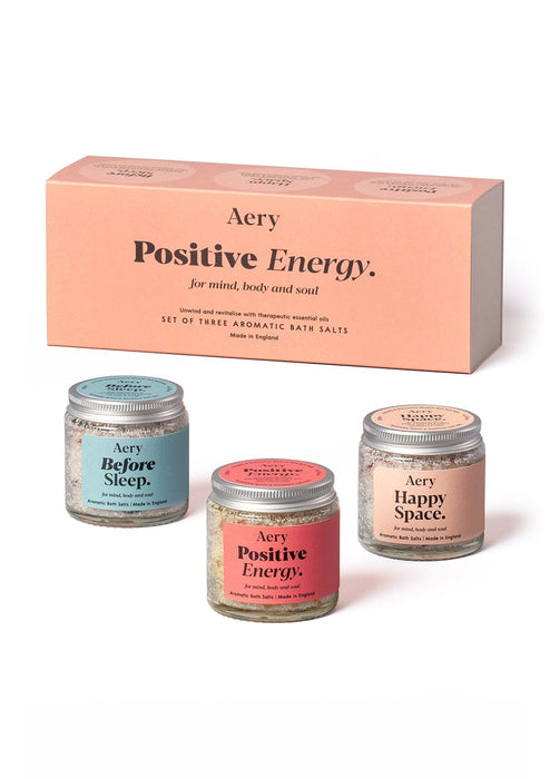 Positive Energy mini Bath Salts gift set of three by Aery displayed next to product packaging on white background 