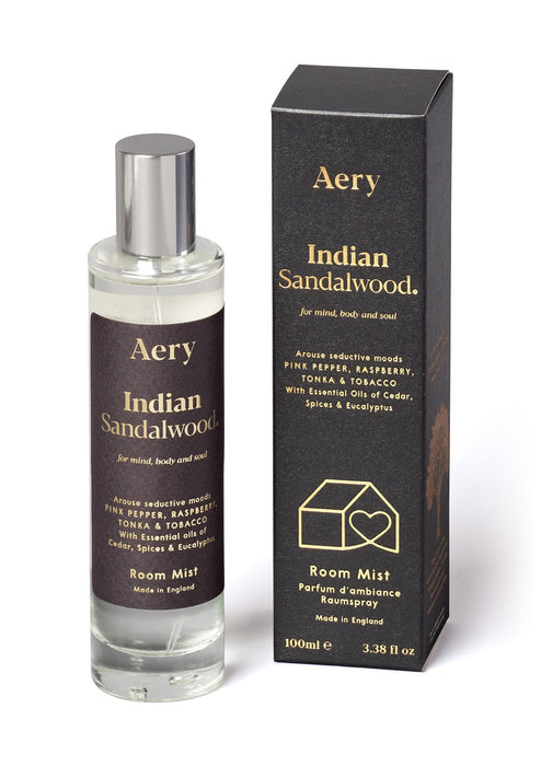 Black Indian Sandalwood room mist by Aery displayed next to product packaging on white background 