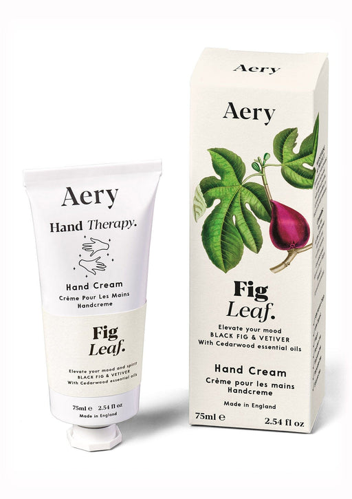 Cream Fig Leaf hand cream displayed next to product packaging on white background 