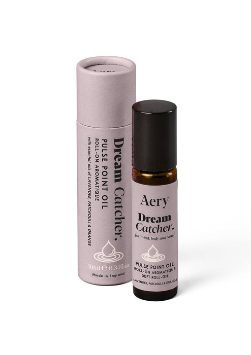 Lilac Dream Catcher pulse point oil by Aery Displayed next to product packaging on white bacground 