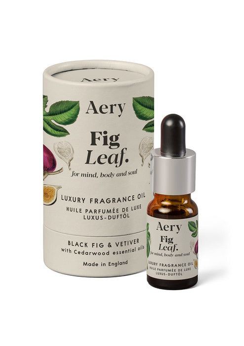 Fig Leaf fragrance oil by Aery displayed next to product packaging on white bacground 