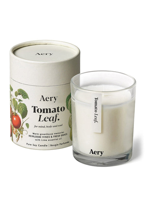 Tomato Leaf candle by Aery displayed next to product packaging on white background 