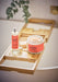 Red Positief Energy bath salts by aery displayed next to room mist in bathroom 