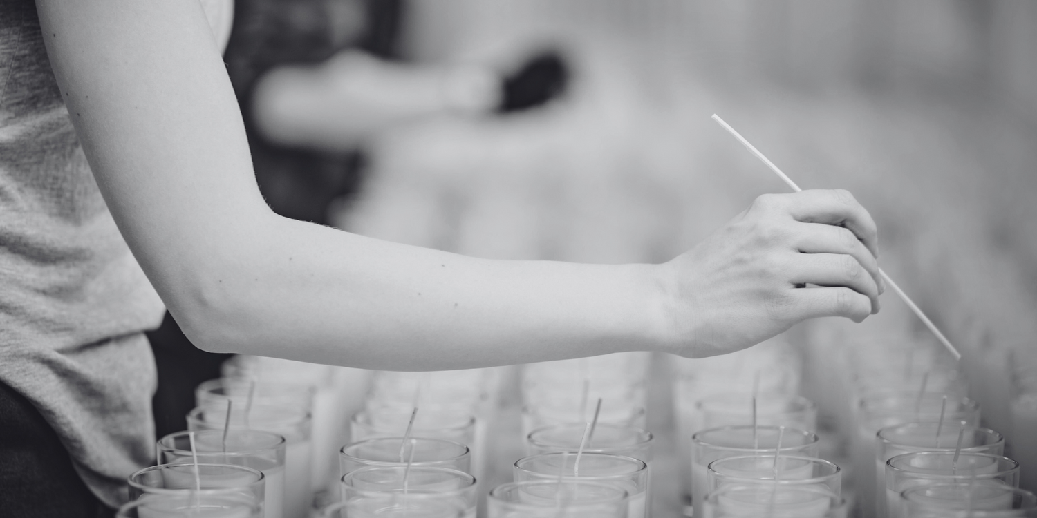 black and white photo of candle wicking process