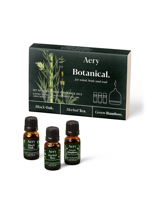 green botanical fragrance oil kit by aery living displayed next to decorative product packaging