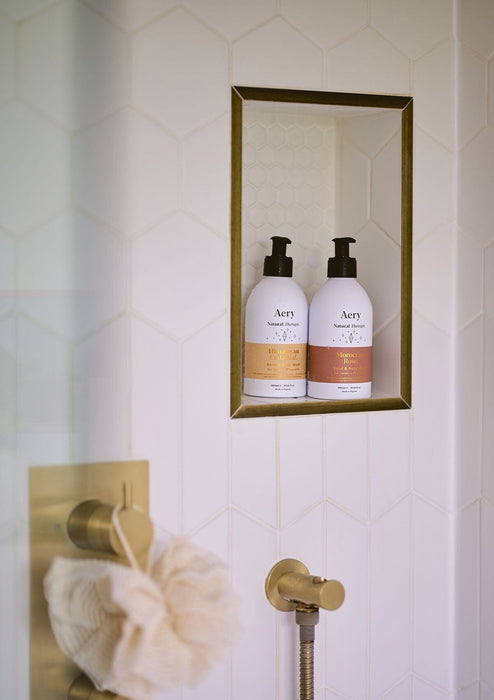 himalayan cedarleaf and moroccan rose body wash in shower setting