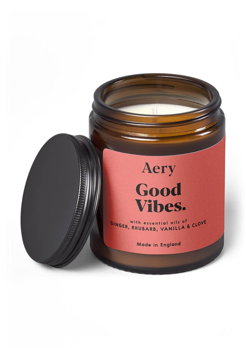 Pink Good Vibes candle by Aery displayed on white bacground 