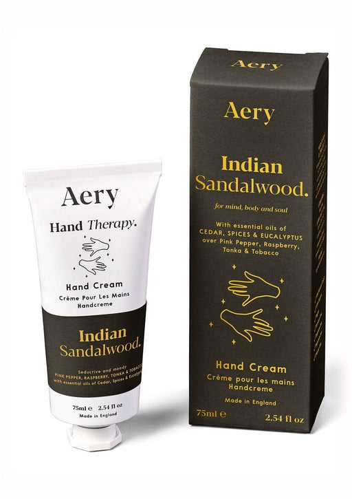 scented moisturising hand cream displayed next to decorative product packaging by aery living